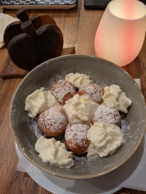 nougat dumplings with whipped cream made from potatoes