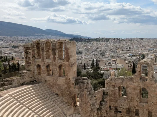 view over athens with a section of the theatron in the lower area